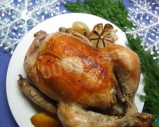 Курица с лимоном запеченная целиком