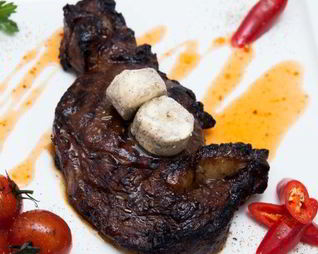 Стейк рибай с ароматным маслом