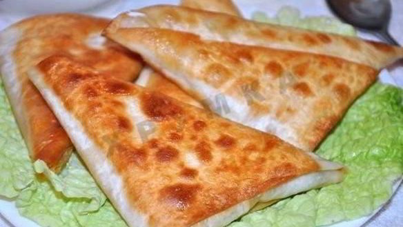 Рецепт Быстрых пирожков из лаваша с сыром и ветчиной