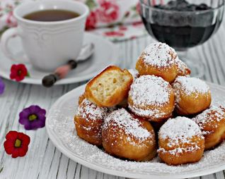 Творожные пончики в масле